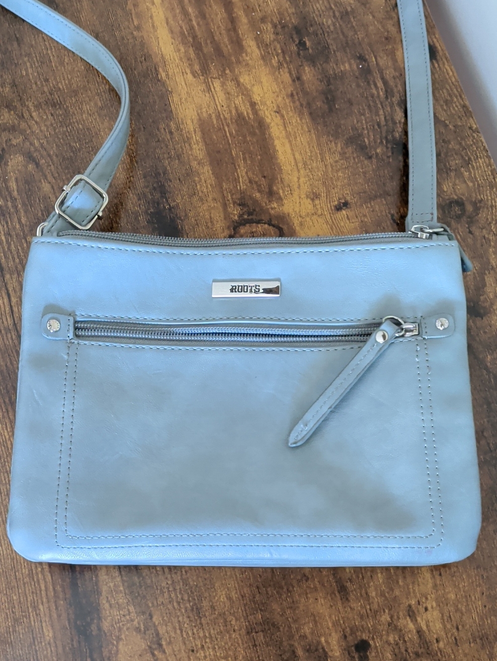 Roots Pale Blue Leather Crossbody Bag
